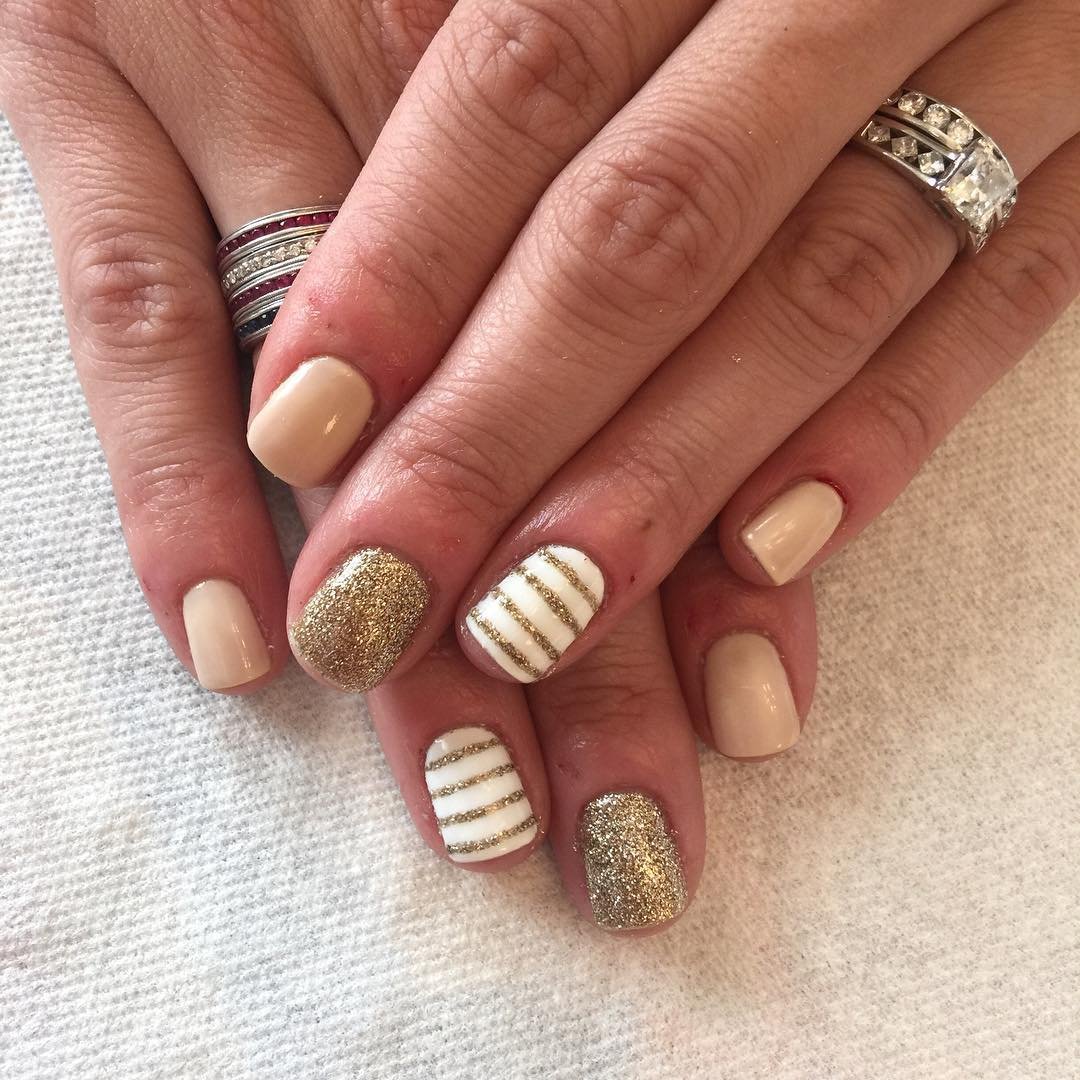 women's white and gold nails