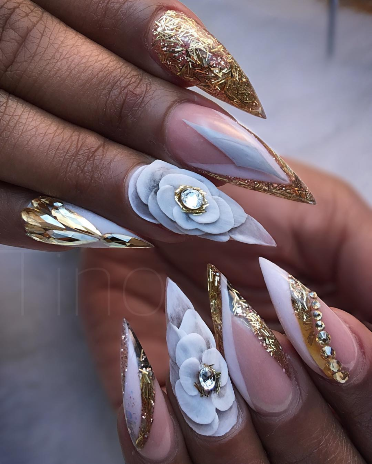 women's white and gold nails
