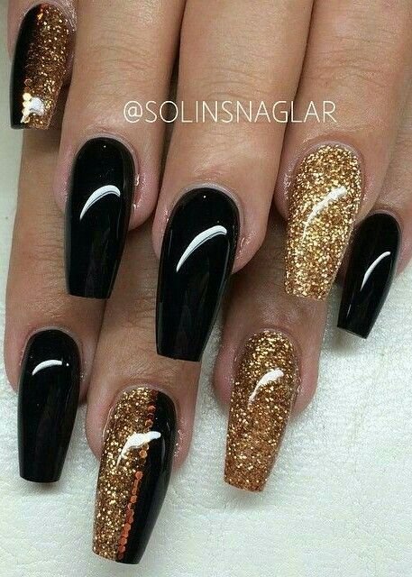 women's black and gold nails