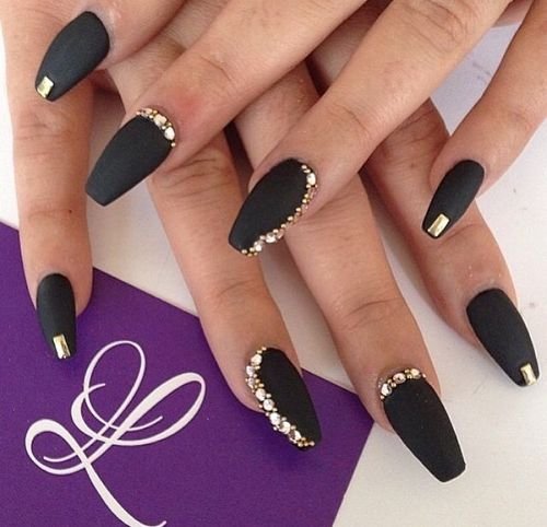 women's black and gold nails